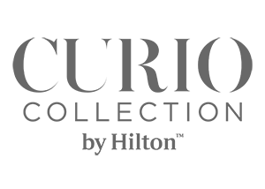 Curio Collection by Hilton logo